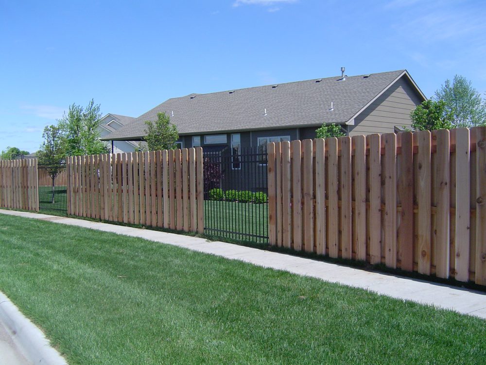 Pressure treated outlet privacy fence