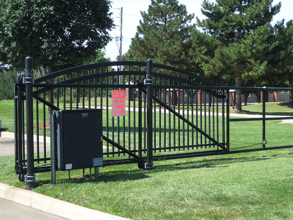 Closed automatic gate blocking a driveway