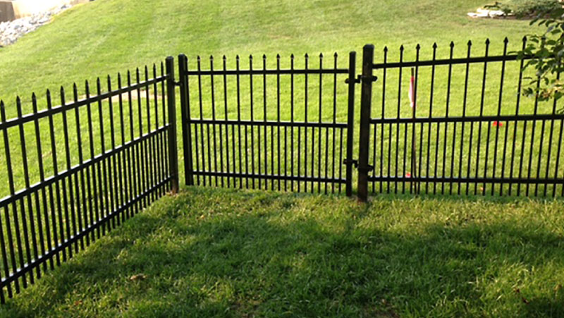 Aluminum fence with outlet puppy pickets